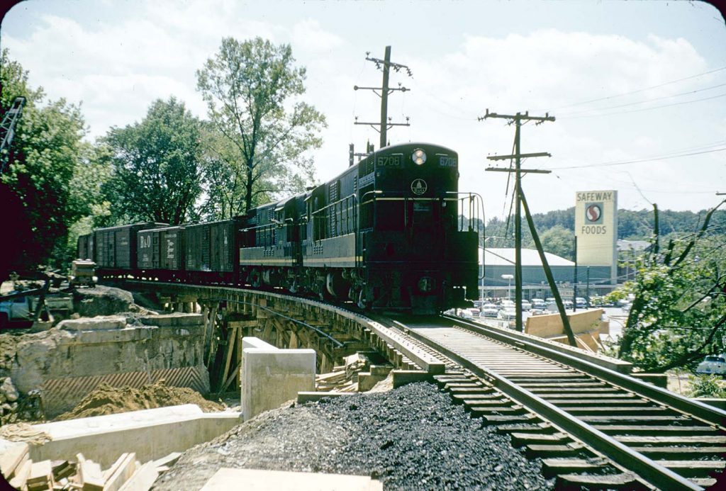 A duo of H16-44's traverses the shoofly bridge over Bradley Blvd., (May 1959)